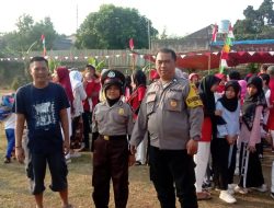 Bhabinkamtibmas Kelurahan Ciputat Pantau Gerak Jalan Santai Sambut HUT RI ke-79
